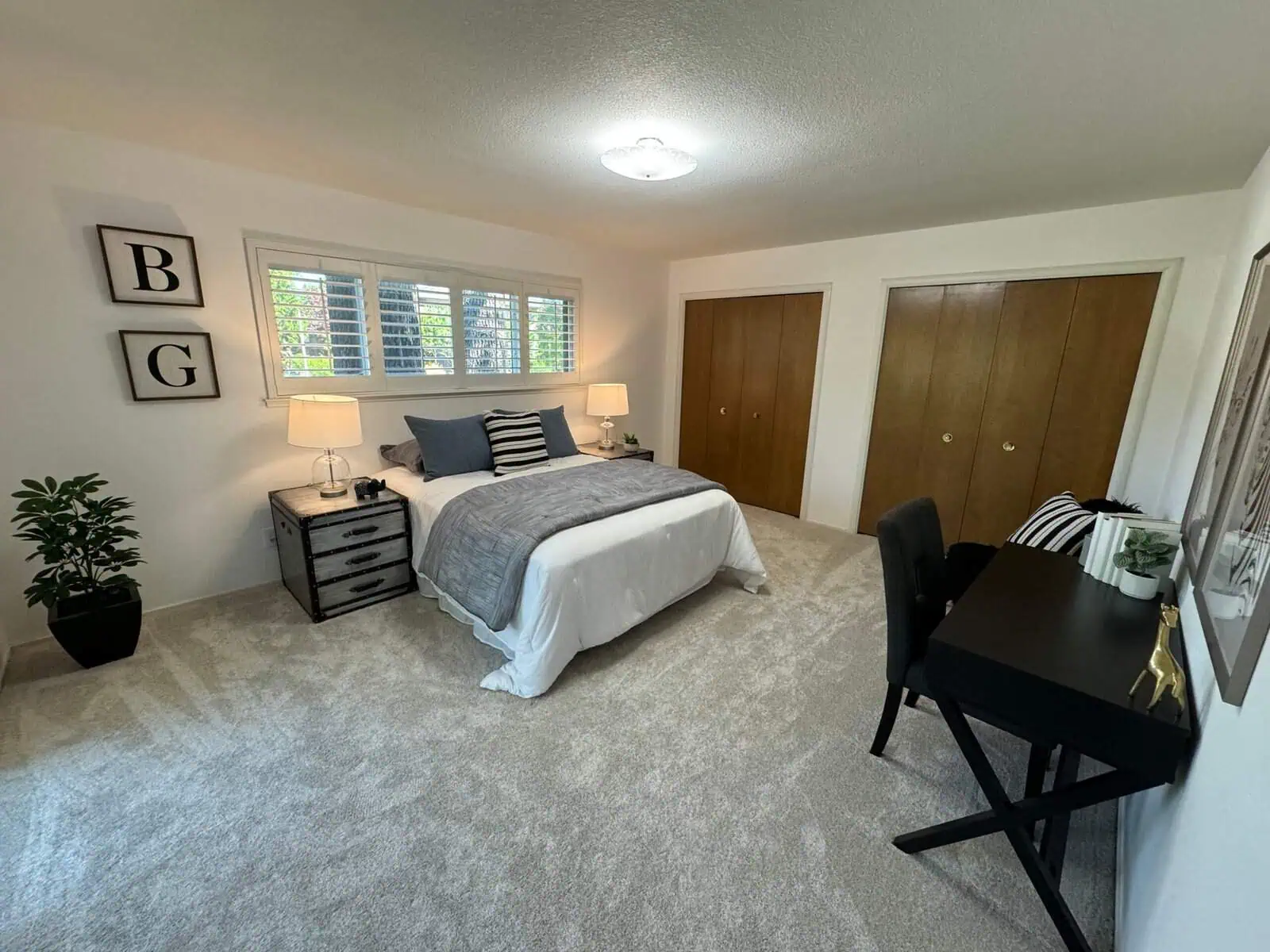 Bedroom with modern decor and natural light.