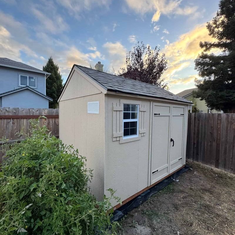 Outdoor garden shed for storing tools, equipment, and gardening supplies.